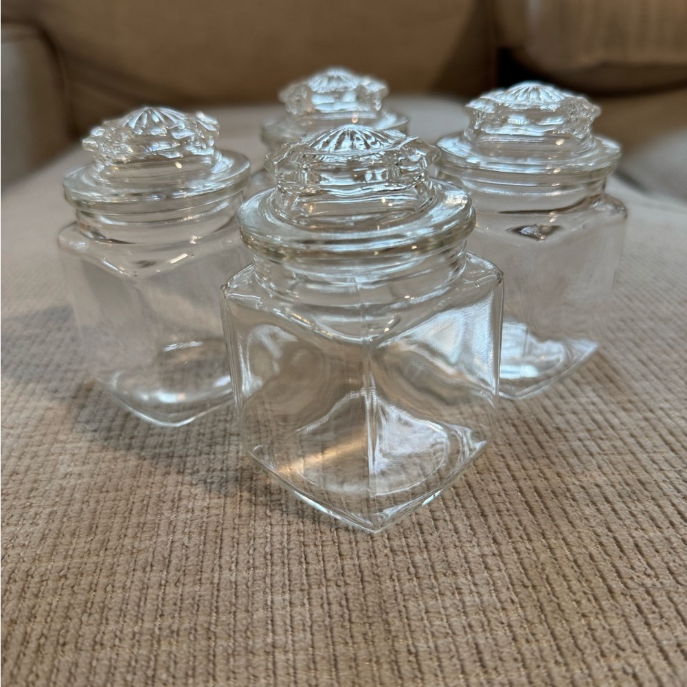Set of 4 Clear Glass Apothecary Jars with Starburst Lids